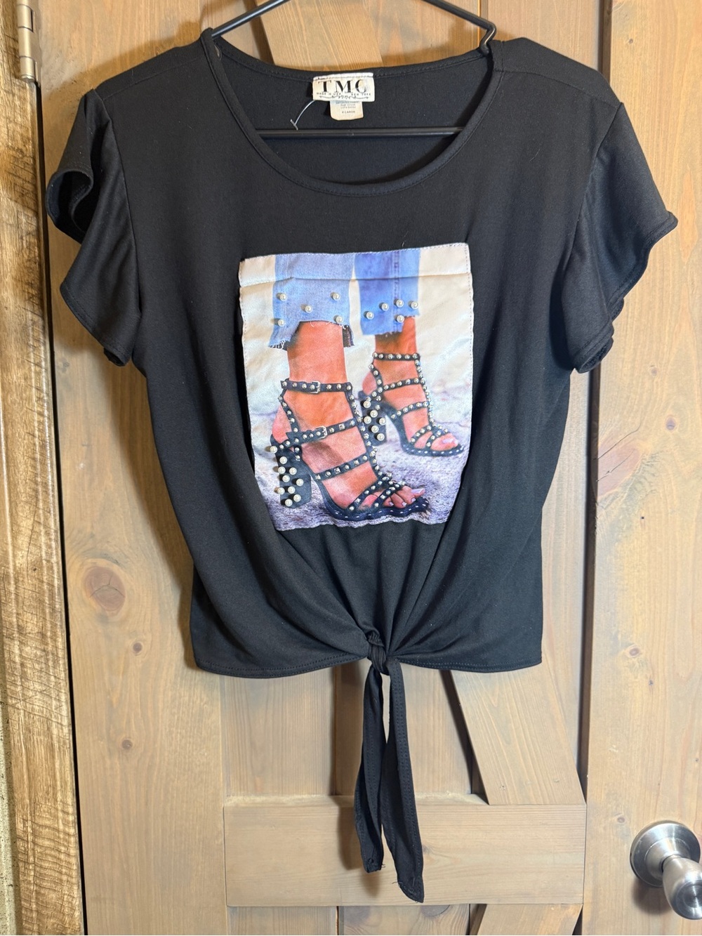 TMC Black Short Sleeve Tie-Front Tee with Studded Graphic